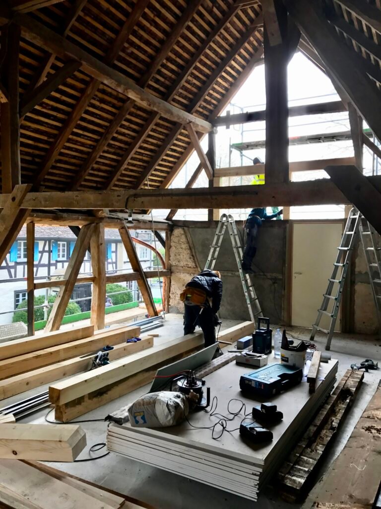 Reprise de la structure d'une grange, chantier phase gros oeuvre, architecte d'intérieur paris