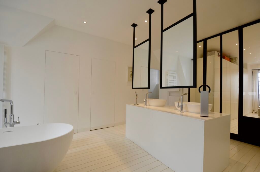 Master suite bathroom and dressing area within a private townhouse