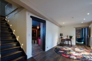 entrée, hôtel tapis rond fleurs, architecte d'intérieur paris