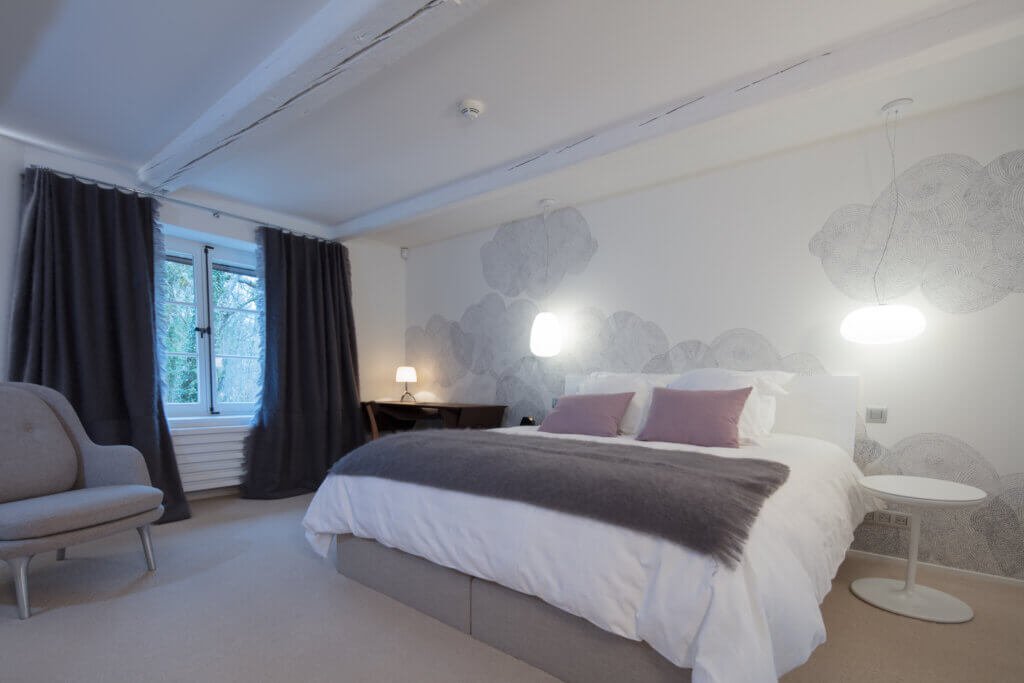 Luxury Paris interior design – elegant bedroom suite by Charles-Eric Guerrier.