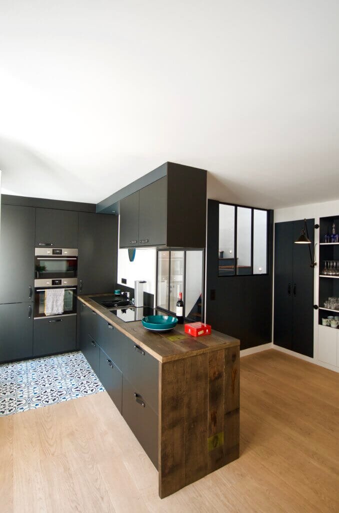 Duplex apartment in Paris 12e, open kitchen with central island and custom cabinetry, client-side representation.