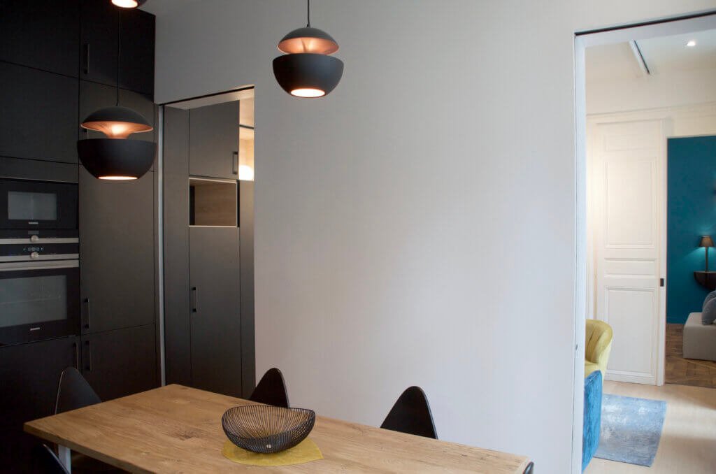 Dining area connecting the kitchen, living room and bedroom